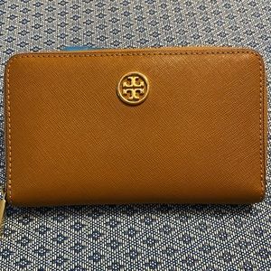 Brown Tory Burch zipper wallet